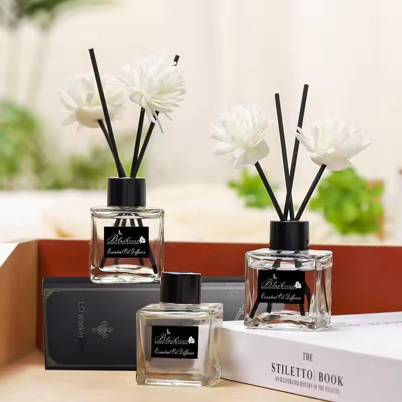 Parfum petit flacon carré à rayures noires